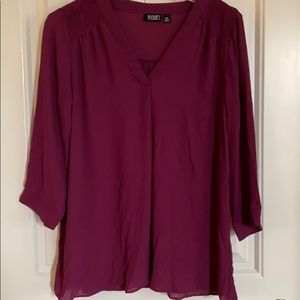 Tunic length swing hem blouse